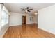 Bright living room features hardwood floors, ceiling fan, and neutral walls at 1226 Forestwood Dr, Charleston, SC 29407
