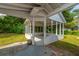 Cozy screened porch with outdoor access and backyard views at 1226 Forestwood Dr, Charleston, SC 29407