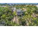Charming coastal home nestled among lush trees, offering a serene and private setting near the beach at 123 Jungle Rd, Edisto Island, SC 29438