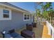 Spacious back deck with outdoor seating, perfect for enjoying the surrounding nature at 123 Jungle Rd, Edisto Island, SC 29438
