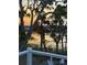 Breathtaking water view with a stunning sunset, seen from a relaxing outdoor space with chairs at 123 Jungle Rd, Edisto Island, SC 29438
