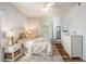 Bright bedroom with hardwood floors, a ceiling fan, and two windows with nice view at 1300 Park West Blvd # 811, Mount Pleasant, SC 29466