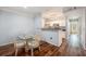 Dining area with view of kitchen, stainless appliances, and granite countertops at 1300 Park West Blvd # 811, Mount Pleasant, SC 29466