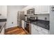 Close up view of kitchen with stainless steel appliances and granite countertops at 1300 Park West Blvd # 811, Mount Pleasant, SC 29466