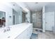 Elegant bathroom with a double sink vanity and a frameless glass shower at 133 Alder Cir, Charleston, SC 29412