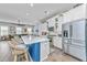 Bright kitchen featuring white cabinets, stainless steel appliances, and a center island with seating at 133 Alder Cir, Charleston, SC 29412