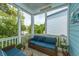 Relaxing outdoor porch with comfortable seating, perfect for enjoying the fresh air and scenery at 133 Alder Cir, Charleston, SC 29412