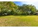 Expansive and well-manicured backyard perfect for outdoor activities and entertaining at 1405 S Edgewater Dr, Charleston, SC 29407