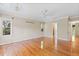 Spacious bedroom with hardwood floors, ceiling fan, and natural light; a serene retreat at 1405 S Edgewater Dr, Charleston, SC 29407