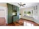 Bright breakfast nook features custom cabinets, granite counters, and a window seat for relaxing with a view at 1405 S Edgewater Dr, Charleston, SC 29407