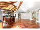 Open-concept kitchen with wood vaulted ceilings seamlessly flowing into the living area at 1405 S Edgewater Dr, Charleston, SC 29407