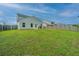 Expansive backyard with lush green grass, offering ample space for outdoor activities and relaxation at 141 Clydesdale Cir, Summerville, SC 29486