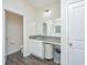 Convenient bathroom vanity with a granite countertop, ample storage, and well lit mirror at 141 Clydesdale Cir, Summerville, SC 29486