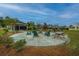 Community space featuring a fire pit, picnic table, and playground, perfect for outdoor gatherings and activities at 141 Clydesdale Cir, Summerville, SC 29486
