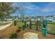 Community dog park with secure fencing, waste stations, and ample space for pets to roam and play at 141 Clydesdale Cir, Summerville, SC 29486