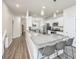 Modern kitchen with granite countertops, stainless steel appliances, and a breakfast bar at 141 Clydesdale Cir, Summerville, SC 29486