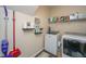 Well-organized laundry room with modern appliances and stylish decor for a functional and inviting space at 141 Clydesdale Cir, Summerville, SC 29486