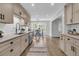 Bright kitchen with modern cabinetry, stainless appliances, and an adjacent dining area at 1541 Hutton Pl, Charleston, SC 29407