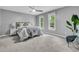 Serene main bedroom with neutral tones, plush bedding, and ample natural light at 1541 Hutton Pl, Charleston, SC 29407