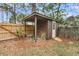 A backyard shed with a rustic, natural setting at 1541 Hutton Pl, Charleston, SC 29407