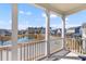 Gorgeous balcony with a view of a pond and homes in the neighborhood at 1580 Cranes Nest Rd, Mount Pleasant, SC 29466