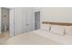 Cozy bedroom with neutral tones, closet space, and adjacent bathroom at 1580 Cranes Nest Rd, Mount Pleasant, SC 29466