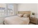 Cozy bedroom with a full-sized bed and windows with bright, natural light at 1580 Cranes Nest Rd, Mount Pleasant, SC 29466