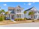 Charming two-story home with double porches and well-maintained landscaping at 1580 Cranes Nest Rd, Mount Pleasant, SC 29466