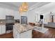 Open concept kitchen featuring stainless steel appliances, granite countertops, and seamless flow to dining and living areas at 1580 Cranes Nest Rd, Mount Pleasant, SC 29466