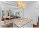Open concept view showcasing kitchen with island and into living room, seamlessly connecting spaces at 1580 Cranes Nest Rd, Mount Pleasant, SC 29466
