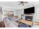 Open concept living room with fireplace and views of the kitchen at 1580 Cranes Nest Rd, Mount Pleasant, SC 29466