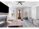 Cozy living room with a stone fireplace and comfortable seating at 1580 Cranes Nest Rd, Mount Pleasant, SC 29466