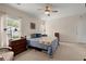 Bedroom showcasing carpet, a ceiling fan, two windows, and two nightstands at 1606 Whitby Ln, Charleston, SC 29414