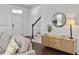 Entryway featuring hardwood floors, stairs, and a wooden console with decor at 1753 Bee Balm Rd, Johns Island, SC 29455