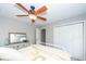 Bedroom with a ceiling fan, dresser, and closet provides ample storage and comfortable living space at 1922 Cedar Petal Ln, Charleston, SC 29414
