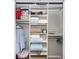 Organized closet with shelves and hanging space offers efficient storage solutions at 1922 Cedar Petal Ln, Charleston, SC 29414