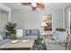 Cozy sunroom with comfortable seating, ceiling fan, and neutral décor at 1922 Cedar Petal Ln, Charleston, SC 29414
