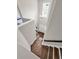 Bright foyer with wooden staircase and contemporary chandelier at 1938 Oak Tree Ln, Mount Pleasant, SC 29464