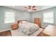 Well-lit bedroom boasts ample natural light and hardwood flooring at 203 Red Fox Run, Summerville, SC 29485