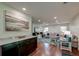 Cozy living room features a large sectional sofa, and a stylish bar area at 203 Red Fox Run, Summerville, SC 29485