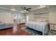 Comfortable main bedroom features hardwood floors, neutral paint, and stylish decor at 203 Red Fox Run, Summerville, SC 29485