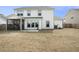 Spacious backyard with a screened-in porch and lush green lawn at 2064 Parish House Cir, Johns Island, SC 29455