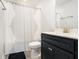 Bathroom featuring a shower-tub combo and dark vanity with silver fixtures at 2064 Parish House Cir, Johns Island, SC 29455