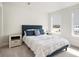 Comfortable bedroom with natural light and a serene view from the window at 2064 Parish House Cir, Johns Island, SC 29455