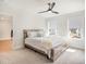 Bedroom with a modern bed, carpeted floors, ceiling fan and plenty of natural light at 2064 Parish House Cir, Johns Island, SC 29455