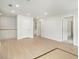Bright hallway features light wood floors, white trim, and recessed lighting at 2064 Parish House Cir, Johns Island, SC 29455