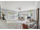 Spacious main bedroom featuring light gray walls, carpet flooring, and French doors leading to a balcony at 2206 Weepoolow Trl, Charleston, SC 29407