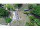 Aerial view of a single story home featuring trees and a well-maintained lawn at 226 Collier Ln, Moncks Corner, SC 29461