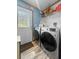Spacious laundry room featuring a washer, dryer, and ample space for storage, simplifying chores at 226 Collier Ln, Moncks Corner, SC 29461
