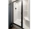 Modern shower with a glass door and white tile, creating a clean and luxurious bathroom experience at 226 Collier Ln, Moncks Corner, SC 29461